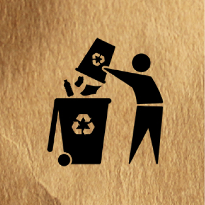 Person dumping recycling in can