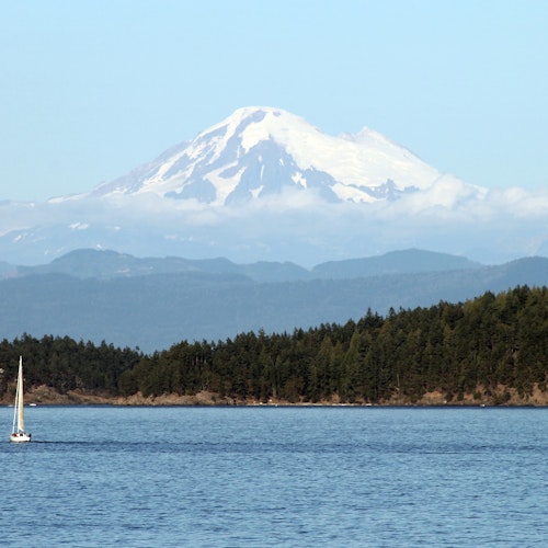 Mount Baker and a sailboat in Puget Sound