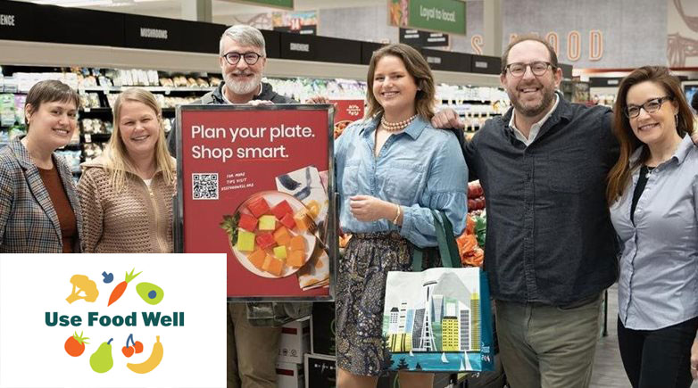 Team members in a grocery store to kick off the Use Food Well campaign