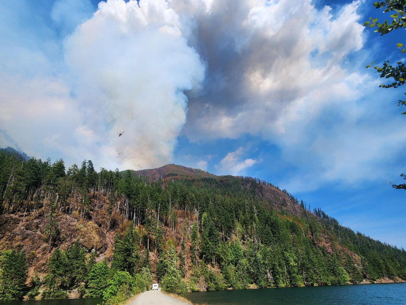 Smoke from a wildfire over a mountain